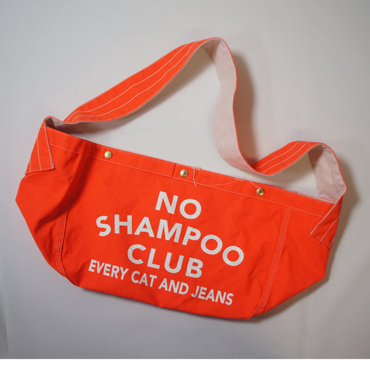 TCB jeans_NEWS PAPER BAG_ORAGE